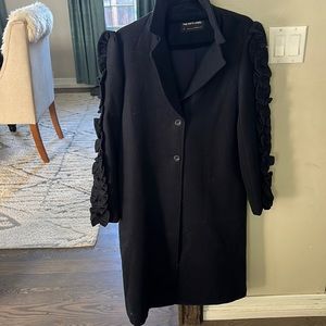 Navy ruffle sleeve trench coat from Anthropologie